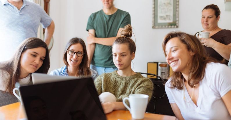 Visionary Leader - People Looking at Laptop Computer