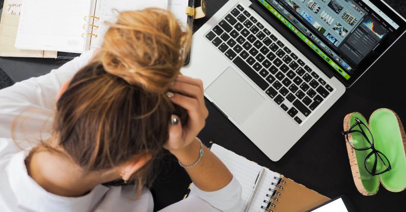 Continuous Learning - Woman Sitting in Front of Macbook