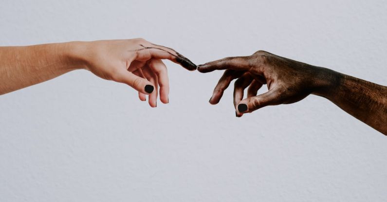 Community Relations - Hands of people reaching to each other