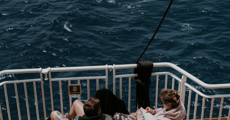 Innovation Barriers - Two people sitting on the deck of a cruise ship