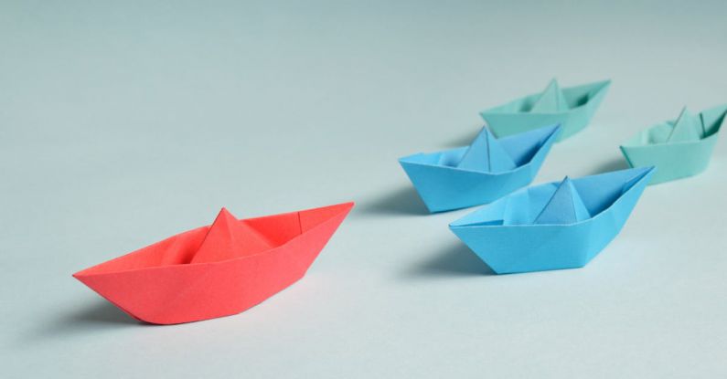 Empathetic Leadership - Paper Boats on Solid Surface